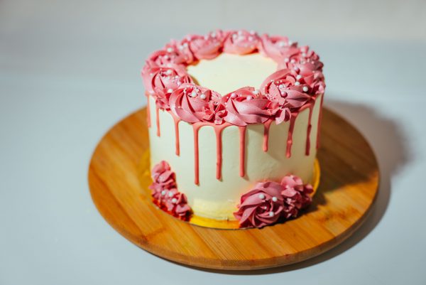 White pink drip cake