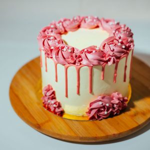 White pink drip cake